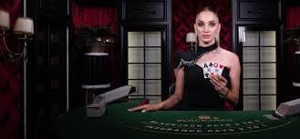 Live casino game room with professional dealer and multiple players